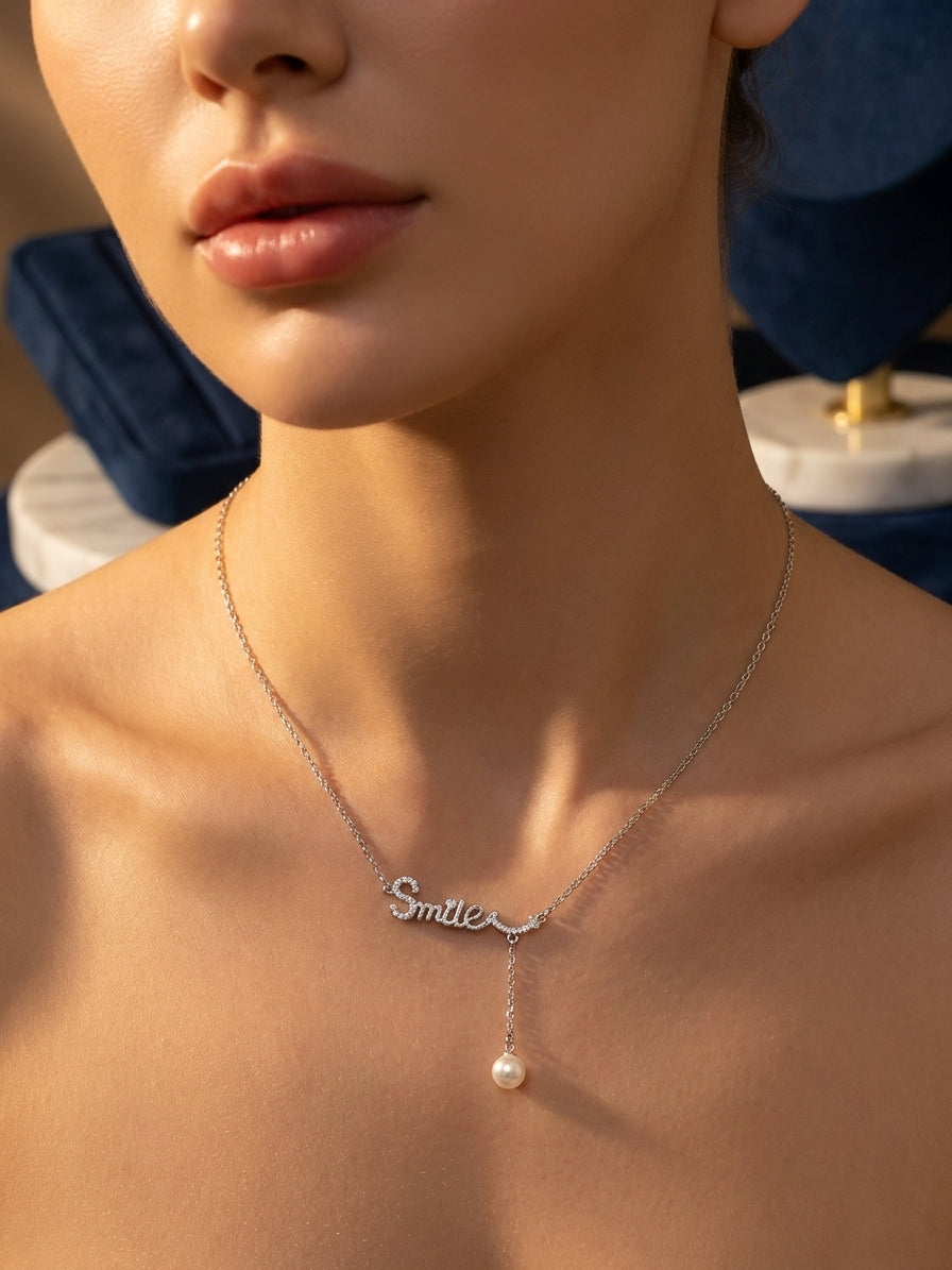 Silver-Tone 'Smile' Pendant Necklace with Crystal Accents and Pearl Drop