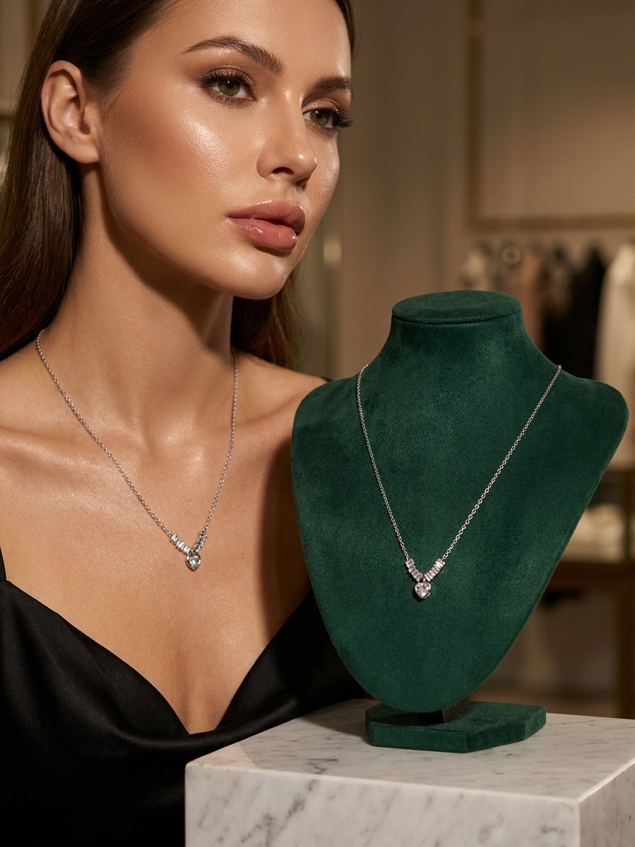 Elegant Silver Heart Pendant Necklace with Sparkling Baguette Accents
