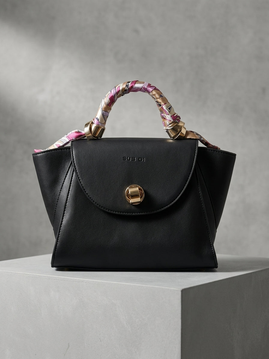 Black Chic Handbag with Scarf-Wrapped Handle and Gold Hardware