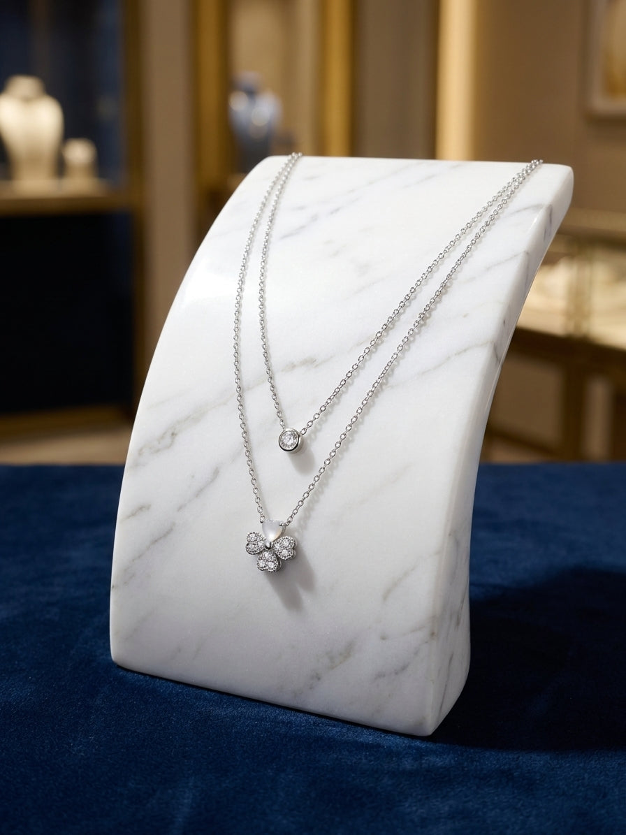Elegant Double Layered Silver Necklace with Clover and Crystal Pendants