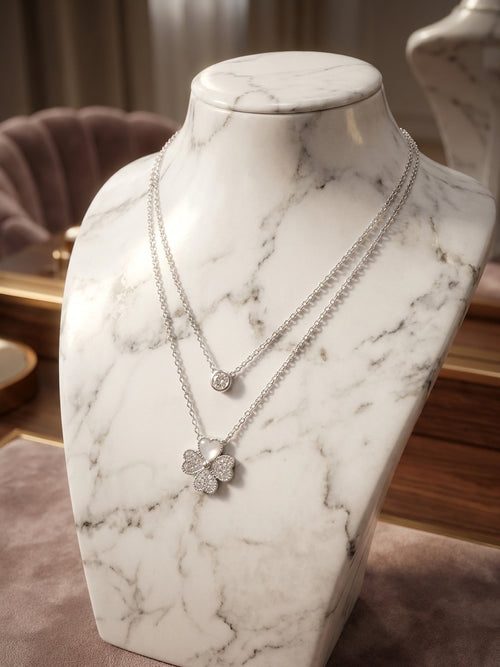 Elegant Double Layered Silver Necklace with Clover and Crystal Pendants
