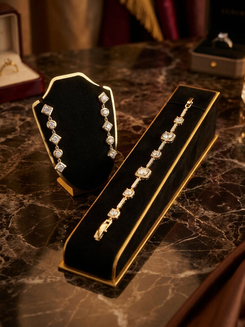 Elegant Gold-Tone Geometric Crystal Jewellery Set - Drop Earrings and Matching Bracelet