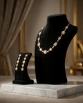 Elegant Gold-Tone Geometric Crystal Jewellery Set - Drop Earrings and Matching Bracelet